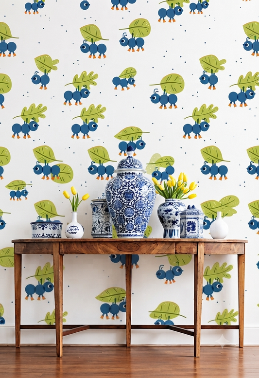 Add a fun and playful touch to your space with this Cute Blue Ant Theme Wallpaper, featuring adorable cartoon ants carrying green leaves on a clean white background.